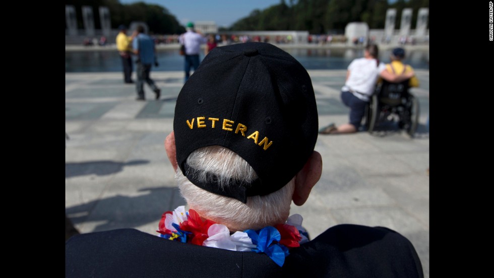 World War II Veteran George Bloss, from Gulfport, Mississippi, looks out over the National World War II Memorial in Washington, on October 1. Veterans who had traveled from across the country were allowed to visit the National World War II Memorial after it had been officially closed because of the partial government shutdown.