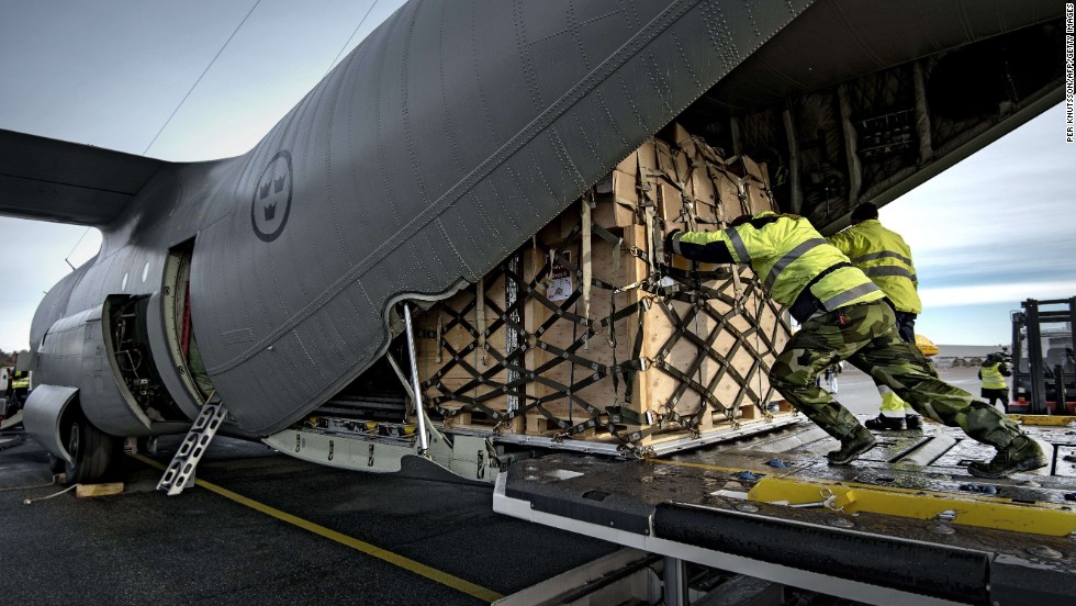 Staff load a Hercules airplane with equipment November 11 at the Orebro airport in central Sweden. The Swedish Civil Contingencies Agency, together with its humanitarian partners, sent equipment to support the United Nations&#39; relief work in the Philippines.