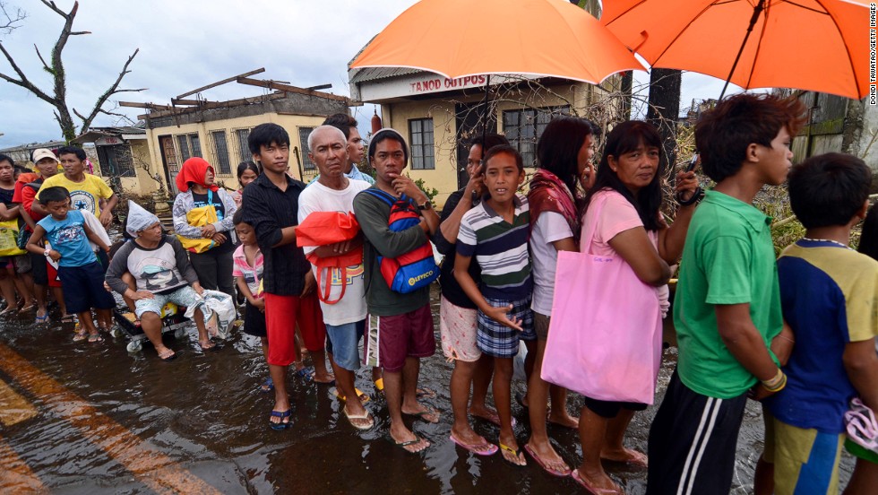 People in Leyte, Philippines, wait in line to receive relief goods Tuesday, November 12.