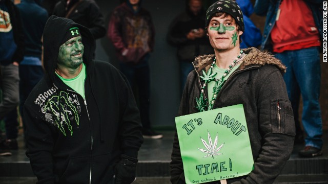 Darren Austin and his son Tyler line up outside the 3D Cannabis Center.