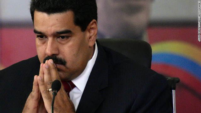 Venezuelan President Nicolas Maduro gestures during a meeting at the Miraflores presidential palace in Caracas, on January 6, 2014. AFP PHOTO/JUAN BARRETO (Photo credit should read JUAN BARRETO/AFP/Getty Images)