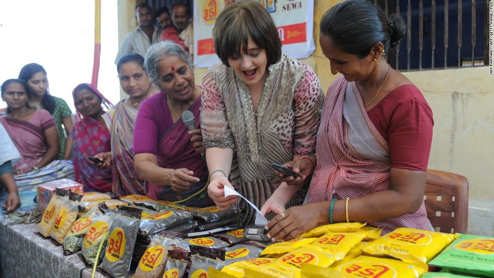 In 2008, she established the Cherie Blair Foundation for Women aimed at providing education and financial aid to female entrepreneurs internationally. With projects in Ghana, Tanzania and Rwanda, the foundation continues to empower local women with the necessary tools to enhance their businesses. Here Blair visits a women&#39;s initiative center in India in March 2013. 
