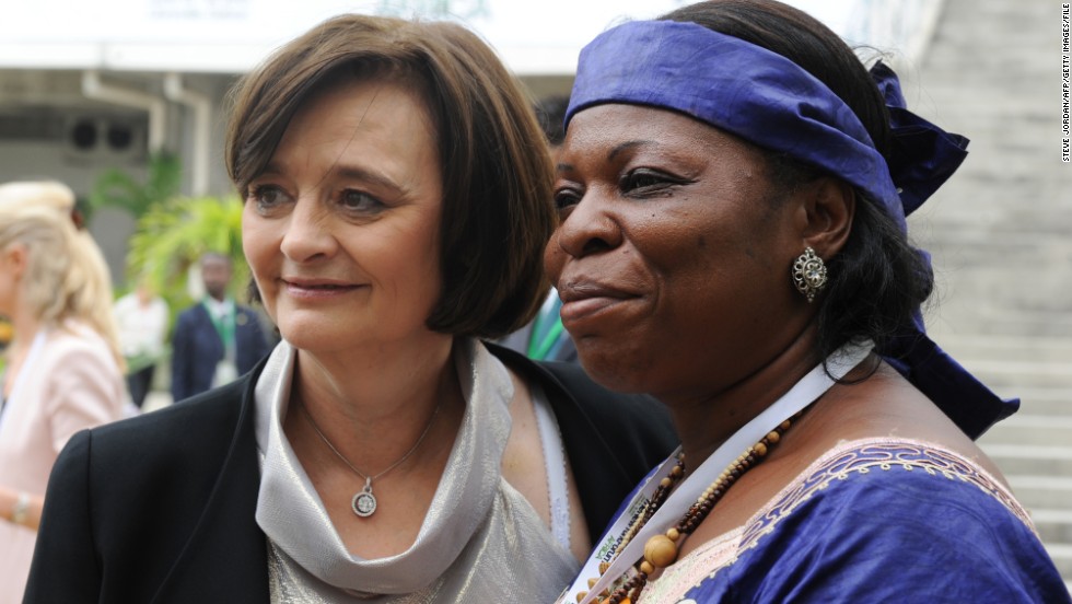 Cherie Blair poses with president of the NGO &#39;Fondation Espoir et Vie&#39; Pauline Lambou Ngouanfou during the New York Forum Africa in Libreville on June 15, 2013. The forum, dedicated to the economic development of Africa, brings together nearly 700 economic policymakers.