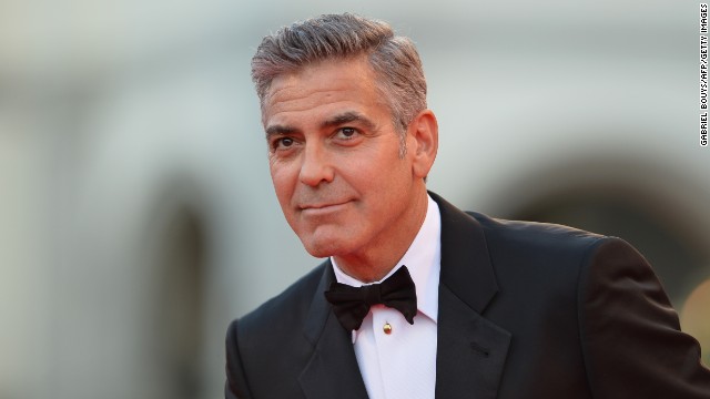 US actor George Clooney arrives for the opening ceremony of the 70th Venice Film Festival and the screening of the movie &#39;Gravity&#39; presented out of competition, on August 28, 2013 at Venice Lido. The Venice film festival kicks off today with the arrival of movie stars on water t