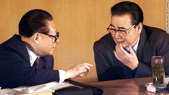 [File photo] Chinese President Jiang Zemin (L) chats with Chairman of the National People's Congress Li Peng during the opening session of the Chinese People's Political Consultative Committee (CPPCC) at the Great Hall of the People in Beijing 03 March 2000. 