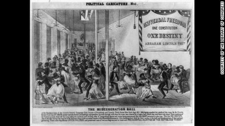 An 1864 satirical cartoon illustrates a &#39;miscegenation ball&#39; at President Abraham Lincoln&#39;s campaign club. 