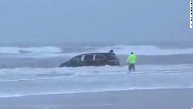 Witness: Mom drove van, kids into waves