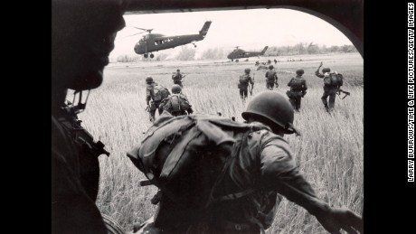 VIETNAM - CIRCA 1965:  US Marines 163rd helicopter Squadron discharging South Vietnamese troops for an assault against the Viet Cong hidden along the tree line in background.  (Photo by Larry Burrows/Time &amp; Life Pictures/Getty Images)