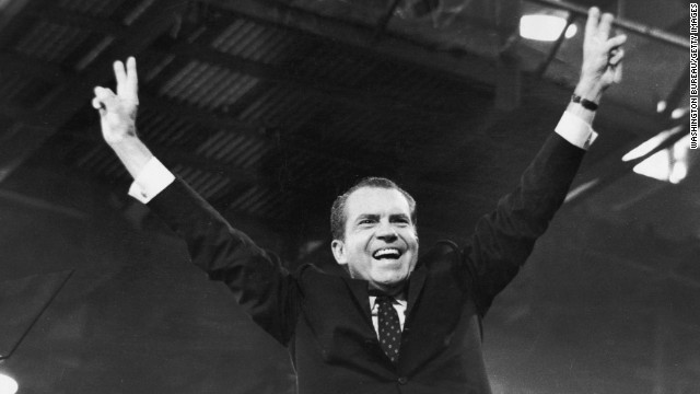 Richard Nixon gives the &#39;V&#39; for victory sign after winning the presidential nomination at the Republican National Convention in August, 1968.