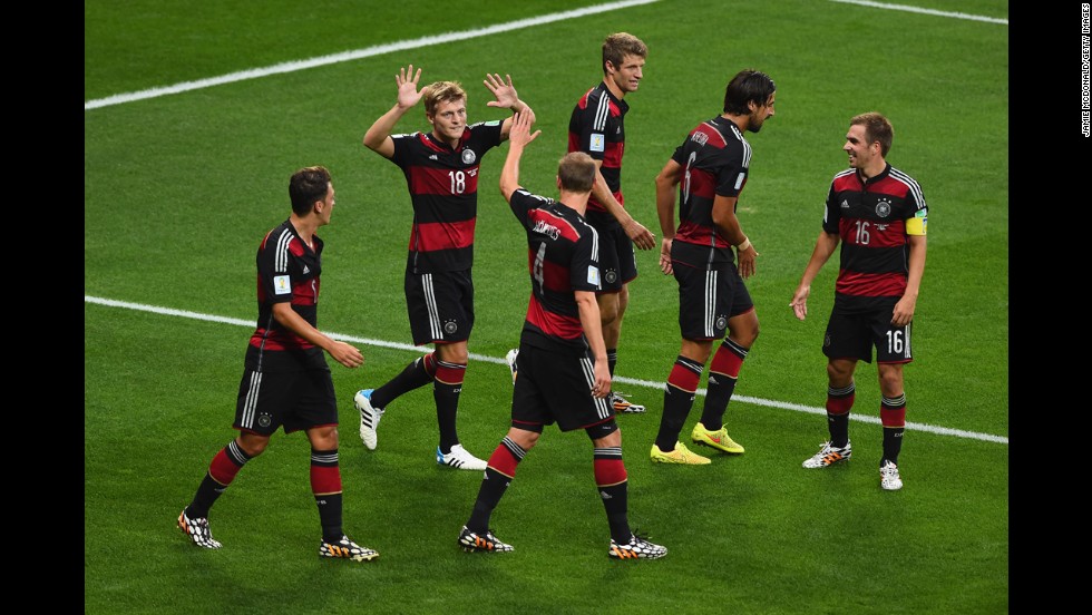 Germany's Toni Kroos, second from left, celebrates scoring his second goal of the game. It put his team up 4-0.