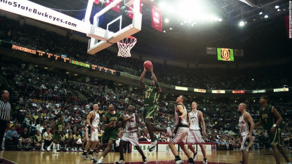 James drives to the hoop in 2002 as he plays for St. Vincent-St. Mary High School in Akron, Ohio. James was already starting to become a household name in high school, and ESPN was even airing some of his games.