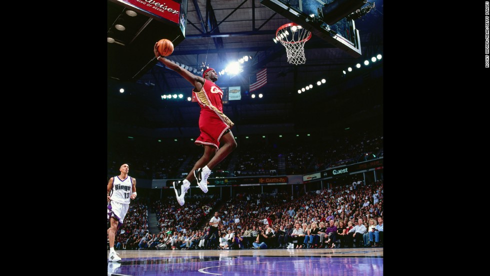 James goes for a dunk during an October 2003 game in Sacramento, California. In his first year in the NBA, he won the league&#39;s Rookie of the Year Award.