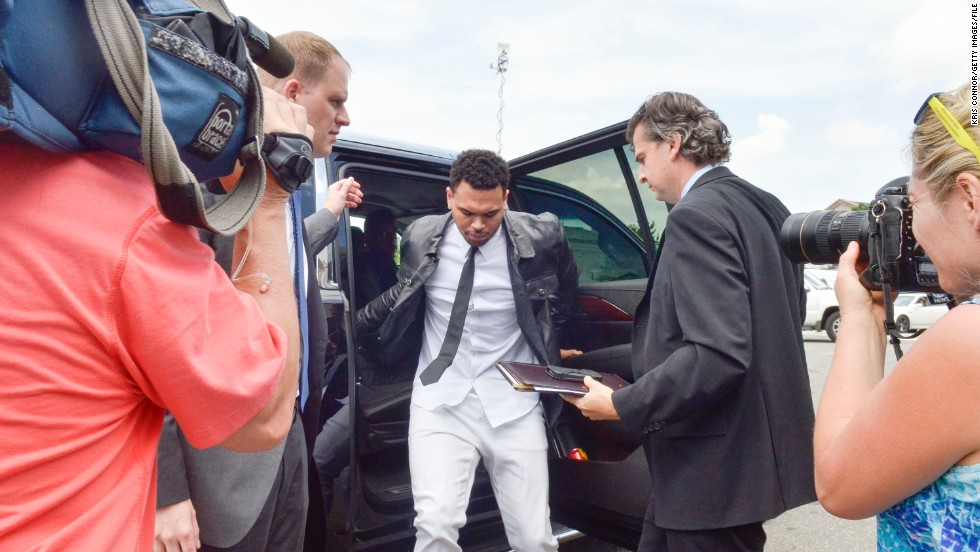 &lt;strong&gt;June 2014:&lt;/strong&gt; The singer gets ready to enter a Washington courthouse for a hearing in his misdemeanor assault case stemming from an October 2013 sidewalk fight in the nation&#39;s capital. Brown rejected a plea deal at that time.