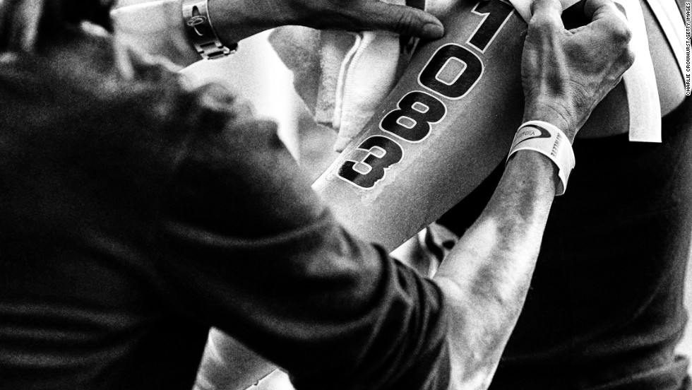 Each triathlete is given a number before undertaking the challenge. &quot;I guess people do it to give themselves a goal or something to aim for,&quot; Crowhurst told CNN. &quot;Perhaps they can&#39;t achieve anymore in a working capacity and want to push themselves in another field.&quot;