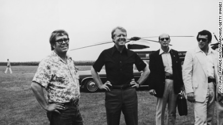 President Carter, second from left, and his brother Billy, left, visit Georgia&#39;s St. Simons Island in 1977.