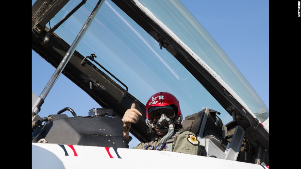CNN&#39;s Carl Lavin gives a thumbs up before his flight at the Embry-Riddle Aeronautical University&#39;s Wings and Waves Air Show in Daytona Beach.