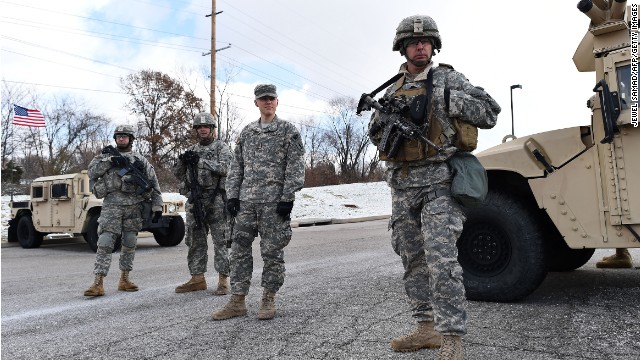 National Guard soldiers man a check point at the police command center set up at a shopping mall in Ferguson, Missouri, on November 27.