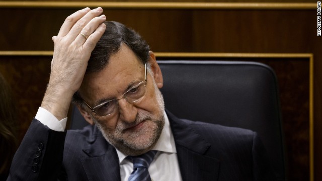Spanish Prime Minister Mariano Rajoy gestures during a control session at the Spain's Lower House of the parliament in Madrid on November 27, 2014. Rajoy will present today a new law aimed at tightening political party accounting rules, the day after his health minister resigned amid a massive corruption scandal. AFP PHOTO/ DANI POZODANI POZO/AFP/Getty Images
