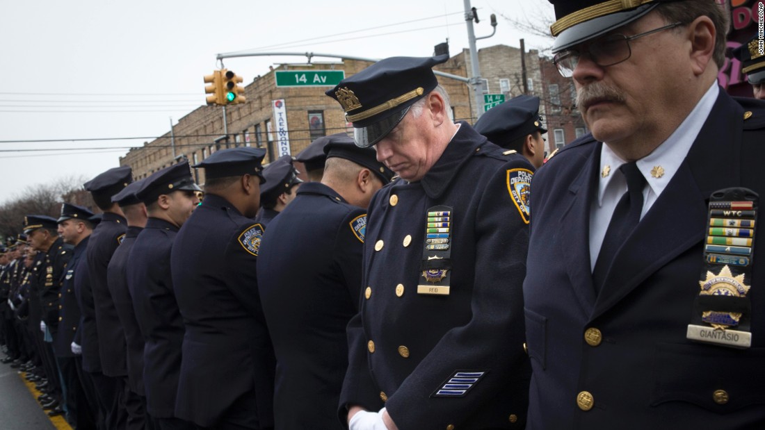 Mourners Pay Respects To Fallen Nypd Officer