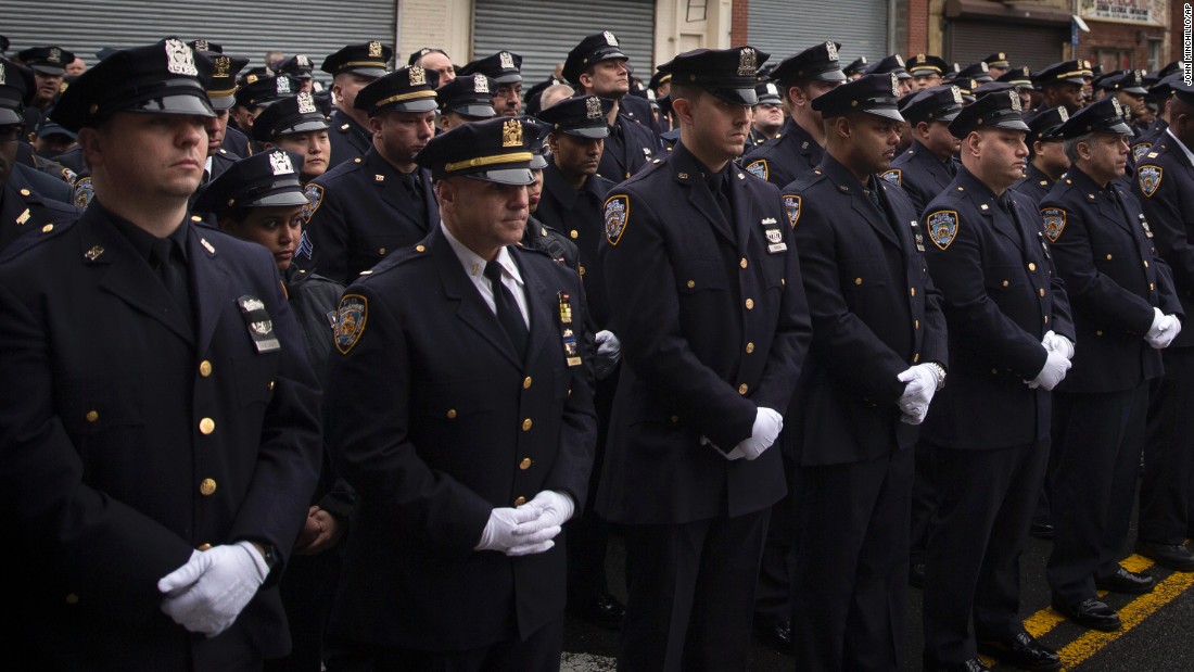 Mourners Pay Respects To Fallen Nypd Officer