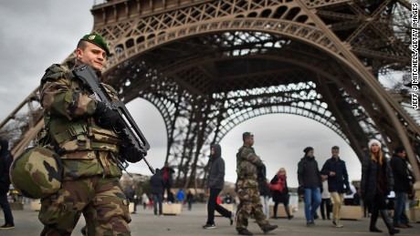  French troops patrol around the Eifel Tower on January 12, 2015 in Paris, France. France is set to deploy 10,000 troops to boost security following last week's deadly attacks while also mobilizing thousands of police to patrol Jewish schools and synagogues. 