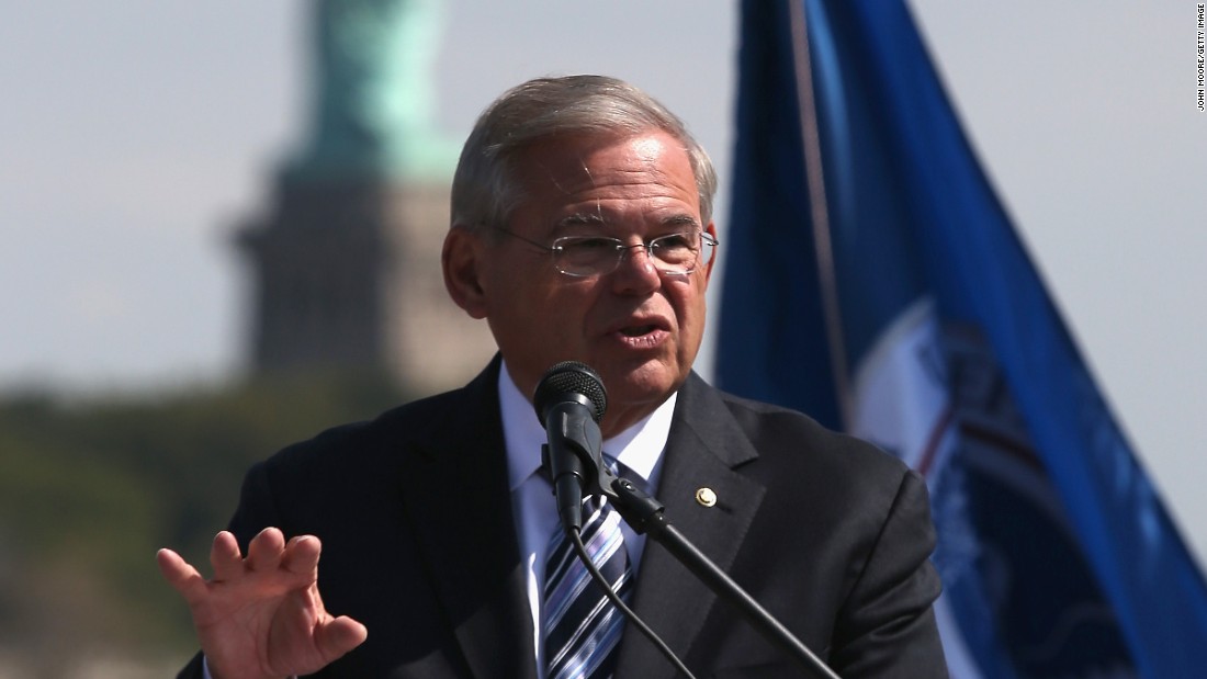 U.S. Senator Robert Menendez (D-NJ) speaks in front of the Statue of Liberty at a naturalization ceremony at Liberty State Park on September 19, 2014 in Jersey City, New Jersey. 