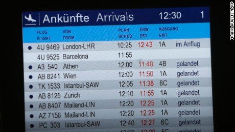 The arrivals board shows Flight 4U 9525 without a status at the airport in Duesseldorf on March 24.