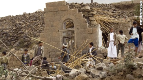 Yemenis gather as they search for survivors in the rubble of houses destroyed by Saudi-led airstrikes in a village near Sanaa, Yemen, Saturday, April 4, 2015. Since their advance began last year, the Shiite rebels, known as Houthis have overrun Yemen&#39;s capital, Sanaa, and several provinces, forcing the country&#39;s beleaguered President Abed Rabbo Mansour Hadi to flee the country. A Saudi-led coalition continued to carry out intensive airstrikes overnight and early Saturday morning targeting Houthi positions. 