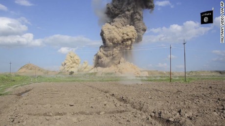 In this image made from video posted on a militant social media account affiliated with the Islamic State group late Saturday, April 11, 2015, purports to show militants destroying the ancient Iraqi Assyrian city of Nimrud, a site dating back to the 13th century B.C., near the militant-held city of Mosul, Iraq. The destruction at Nimrud, follows other attacks on antiquity carried out by the group now holding a third of Iraq and neighboring Syria in its self-declared caliphate. The attacks have horrified archaeologists and U.N. Secretary-General Ban Ki-moon, who last month called the destruction at Nimrud &quot;a war crime.&quot;(militant video via AP)