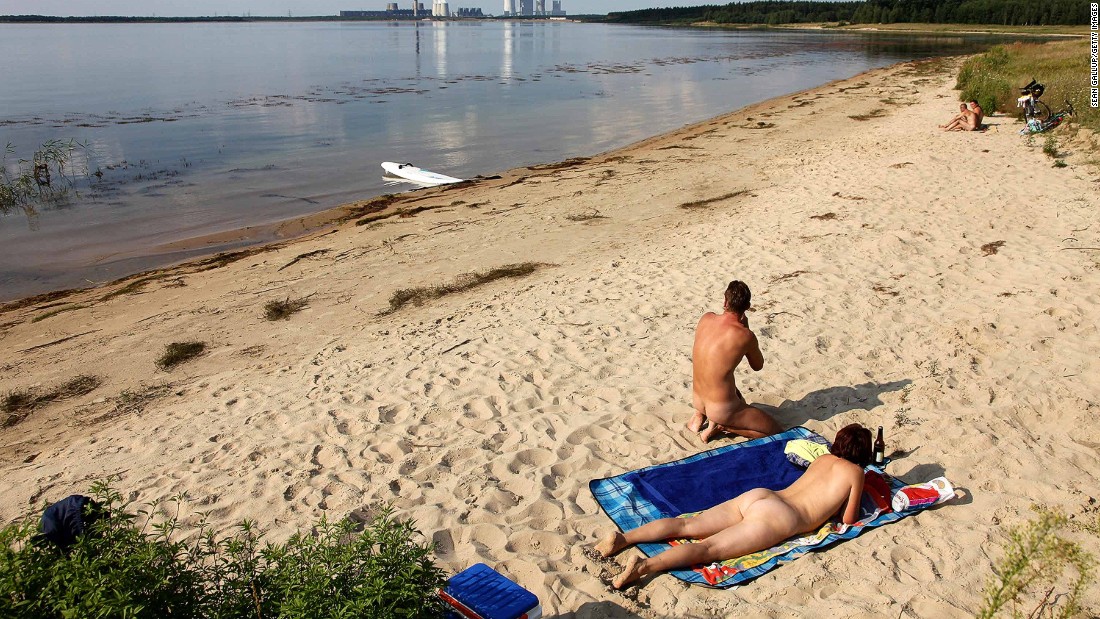 Nude Girl Sun Tanning On Beach