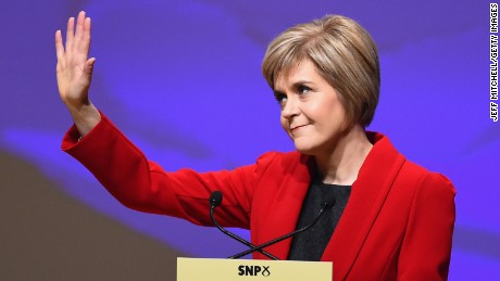  Nicola Sturgeon waves as she gives her first key note speech as SNP party leader at the party&#39;s annual conference on November 15, 2014 in Perth, Scotland. Nicola Sturgeon formally took over the leadership of the SNP from Alex Salmond yesterday, during her speech she urged voters to leave Labour in next May&#39;s UK election