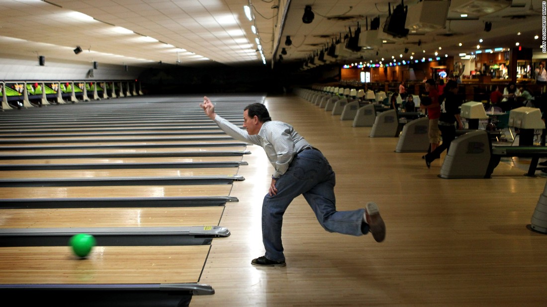 Santorum bowls at Sabre Lanes  in Menasha, Wisconsin, following a campaign rally on April 2, 2012. 