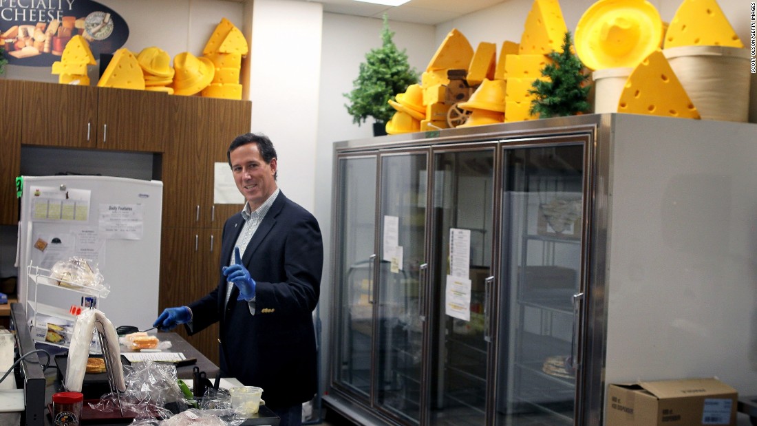 Santorum makes a grilled cheese sandwich during a campaign stop at Simons Specialty Cheese on April 2, 2012, in Appleton, Wisconsin.