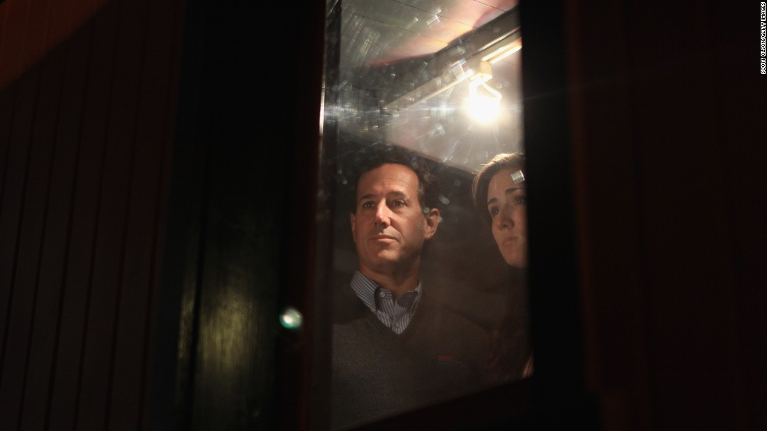 Santorum tours a vintage train car with his daughter Sarah during a campaign stop at the National Railroad Museum on April 1, 2012, in Green Bay, Wisconsin.