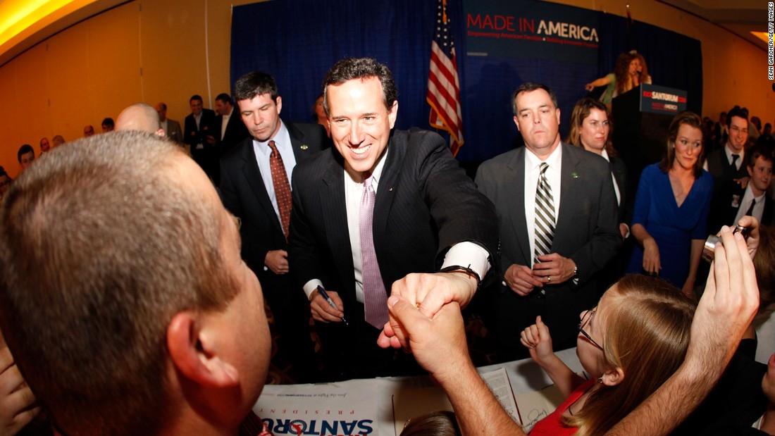 Santorum addresses supporters  in Lafayette, Louisiana, after winning the Alabama and Mississippi primaries on March 13, 2012.
