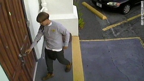  The City of Charleston, South Carolina, provided this surveillance still image showing the person they believe to be a suspect in the shooting death of nine people at the Emanuel African Methodist Episcopal Church on Wednesday night, June 17, 2015.