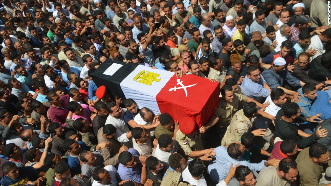 People in Ashmoun, Egypt, carry the coffin for 1st Lt. Mohammed Ashraf, who was killed when the ISIS militant group &lt;a href=&quot;http://www.cnn.com/2015/07/02/world/isis-egypt-expanding-reach/index.html&quot; target=&quot;_blank&quot;&gt;attacked Egyptian military checkpoints&lt;/a&gt; on Wednesday, July 1. At least 17 soldiers were reportedly killed, and 30 were injured.