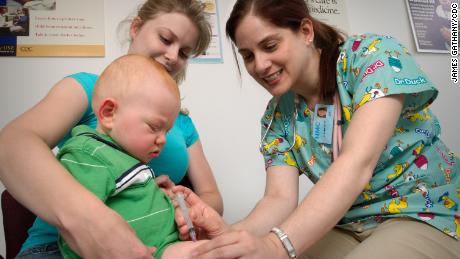 2006
Content Provided by: Judy Schmidt
This photograph shows an infant receiving an intramuscular vaccination in the thigh.

 Vaccinations are most often given via the intramuscular route to optimize the immune response of the vaccine and reduce the adverse reactions in and around the injection site. Infants and young children should be vaccinated in the anterolateral aspect of the thigh. It is a healthy well developed muscular area and has a low risk of neural, vascular and tissue injury making it the safest site of injection. 



