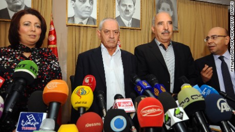 Tunisian mediators arrive to give a press conference to announce the result of its latest bid to mediate an end to the crisis on September 21, 2013 in Tunis. (LtoR) The President of the Tunisian employers union (UTICA), Wided Bouchamaoui, Secretary General of the Tunisian General Labour Union (UGTT) Houcine Abbassi (L) , President of the Tunisian Human Rights League (LTDH), Abdessattar ben Moussa and the president of the National Bar Association, Mohamed Fadhel Mahfoudh. Tunisia&#39;s ruling Islamist party, Ennahda announced on September 20, 2013 that it has accepted an ambitious roadmap proposed by the mediators to form a government of technocrats and resolve the country&#39;s two-month-old political crisis.