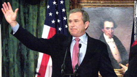 AUSTIN, UNITED STATES:  US President-elect George W. Bush waves farewell to supporters gathered in the Senate Chamber at the State Capitol in Austin, Texas 21 December 2000. President-elect Bush announced his resignation as Texas&#39; governor before the audience.       AFP PHOTO/Paul BUCK (Photo credit should read PAUL BUCK/AFP/Getty Images)