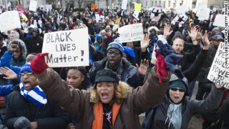 Thousands take part in the Justice for All March and Rally on Pennsylvania Avenue to the US Capitol in Washington, DC, on December 13, 2014, to protest the killings of unarmed African-Americans by police officers and the decisions by Grand Juries to not indict them. AFP PHOTO / SAUL LOEB        (Photo credit should read SAUL LOEB/AFP/Getty Images)
