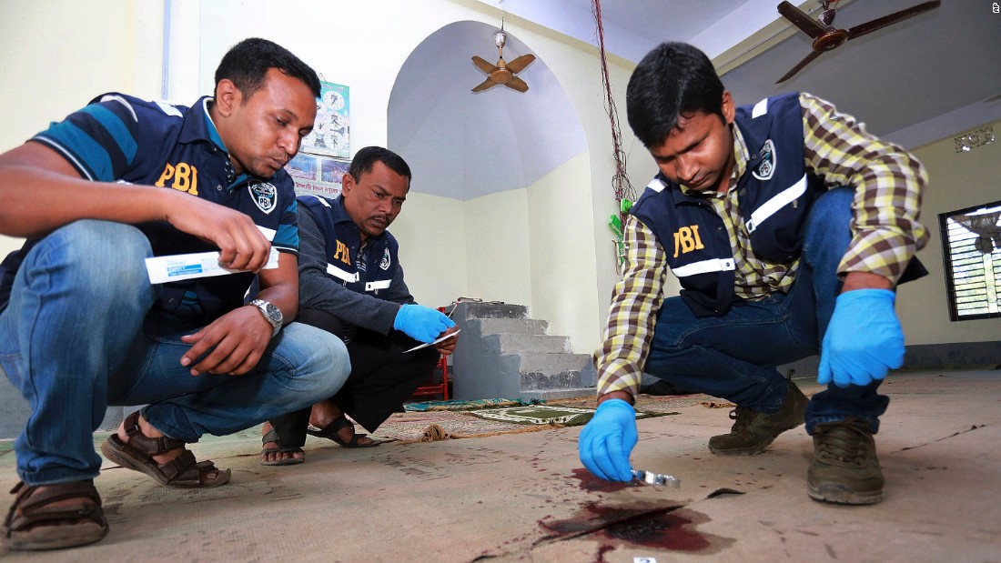 Investigators check the scene of a mosque attack Friday, November 27, in northern Bangladesh&#39;s Bogra district. &lt;a href=&quot;http://www.cnn.com/2015/11/27/asia/bangladesh-isis-attack-claim/index.html&quot; target=&quot;_blank&quot;&gt;ISIS has claimed responsibility for the attack&lt;/a&gt; that left at least one person dead and three more wounded.
