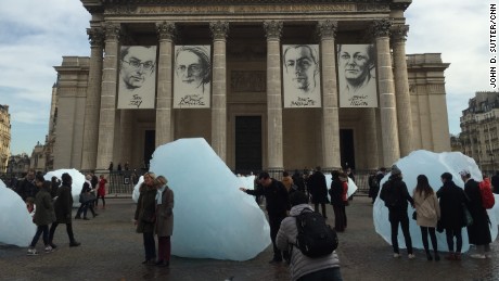 An artist brought tons of ice from Greenland to Paris to raise awareness about climate change. 