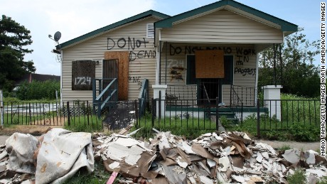 A damaged home painted with the words &quot;Do Not Demo&quot; stands amid debris in 2007 in the Lower Ninth Ward.