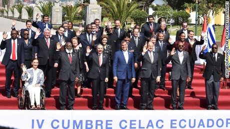 Presidents and other representatives pose for the family picture of the IV Community of Latin American and Caribbean States (CELAC) summit at the Union of South American Nations (UNASUR) headquarters in Quito on January 27, 2016. AFP PHOTO / CRIS BOURONCLE / AFP / CRIS BOURONCLE        (Photo credit should read CRIS BOURONCLE/AFP/Getty Images)