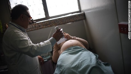 A pregnant woman gets an ultrasound at the maternity of the Guatemalan Social Security Institute (IGSS) in Guatemala City on February 2, 2016. Guatemala increased the monitoring of pregnant women because of the risk of infection by Zika virus. World health officials mobilized with emergency response plans and funding pleas Tuesday as fears grow that the Zika virus, blamed for a surge in the number of brain-damaged babies, could spread globally and threaten the Summer Olympics. AFP PHOTO Johan ORDONEZ / AFP / JOHAN ORDONEZ        (Photo credit should read JOHAN ORDONEZ/AFP/Getty Images)