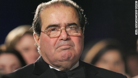 US Supreme Court Justice Antonin Scalia listens as US President George W. Bush speaks at the the Federalist Society&#39;s 25th Anniversary Gala Dinner at Union Station in Washington, DC 15 November 2007. AFP PHOTO/SAUL LOEB (Photo credit should read SAUL LOEB/AFP/Getty Images)