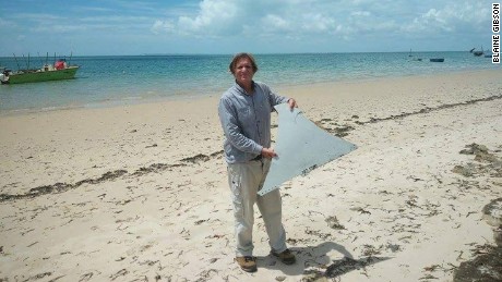 A Mozambican official told CNN the plane part, measuring 35 inches by 22 inches, was discovered by an American tourist, Blaine Gibson, and a local fisherman on a sandbank in Mozambique.