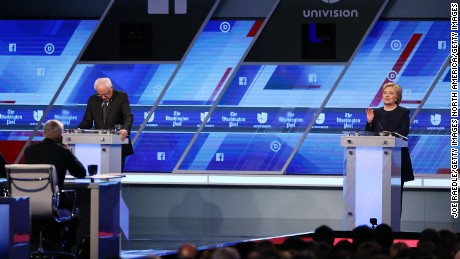 MIAMI, FL - MARCH 09:  Democratic presidential candidate Senator Bernie Sanders (D-VT) and Democratic presidential candidate Hillary Clinton debate during the Univision News and Washington Post Democratic Presidential Primary Debate at the Miami Dade College&#39;s Kendall Campus on March 9, 2016 in Miami, Florida. Voters in Florida will go to the polls March 15th for the state&#39;s primary.  (Photo by Joe Raedle/Getty Images)
