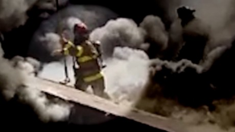Firefighter falls through burning roof elam pkg_00000000.jpg